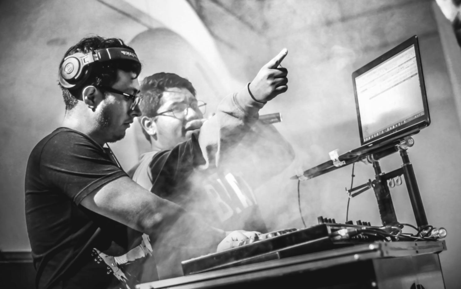 Students collaborating on blockchain development project during intensive coding session